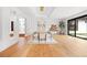 Bright and airy dining room with modern decor, sleek furniture, and an open, inviting layout at 49 Charlou Cir, Cherry Hills Village, CO 80111