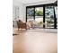 A well lit living room featuring modern furniture and large windows with nature views at 49 Charlou Cir, Cherry Hills Village, CO 80111