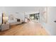 Bright, spacious main bedroom with wood floors, sitting area and modern decor at 49 Charlou Cir, Cherry Hills Village, CO 80111