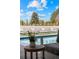 Relaxing pool area featuring modern lounge chairs and serene landscaping for ultimate leisure at 49 Charlou Cir, Cherry Hills Village, CO 80111