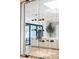 Modern glass-enclosed wine cellar with contemporary wine storage and glass wall at 49 Charlou Cir, Cherry Hills Village, CO 80111