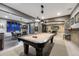 Basement featuring a pool table, dart board and a living area at 5478 Water Oak Cir, Castle Rock, CO 80108