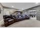 Basement featuring a leather sectional sofa and a pool table at 5478 Water Oak Cir, Castle Rock, CO 80108