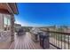 Back deck features a grill and dining area with beautiful neighborhood views at 5478 Water Oak Cir, Castle Rock, CO 80108