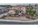 Charming two-story home with a well-manicured lawn and stone retaining wall at 5478 Water Oak Cir, Castle Rock, CO 80108