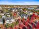 Community overview showcasing homes with fall foliage at 9217 E 4Th Pl, Denver, CO 80230