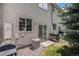Spacious backyard patio with outdoor seating and grilling area, perfect for entertaining at 2141 Coronado N Pkwy # C, Denver, CO 80229