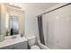 Well-maintained bathroom with shower-tub combo, white tile, and modern fixtures at 2141 Coronado N Pkwy # C, Denver, CO 80229