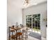 Cozy breakfast nook adjacent to the patio, with natural light and an inviting atmosphere at 2141 Coronado N Pkwy # C, Denver, CO 80229