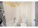 Clean bathroom features a shower-tub combo with a toilet at 1868 S Ammons St # D, Lakewood, CO 80232