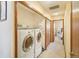 Convenient in-unit laundry featuring stacked washer and dryer hookups at 1868 S Ammons St # D, Lakewood, CO 80232