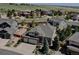An aerial view of the property showing mature landscaping, the roof, and the surrounding neighborhood at 973 Orion Way, Castle Rock, CO 80108