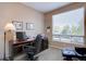 Well-lit home office with a large window and a comfortable workspace, perfect for remote work at 973 Orion Way, Castle Rock, CO 80108