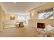 Spacious basement area with carpet flooring, comfortable seating, and natural light at 10619 N Osceola Dr, Westminster, CO 80031