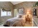 Charming bedroom with floral wallpaper, comfortable bed, and natural light from the window at 10619 N Osceola Dr, Westminster, CO 80031