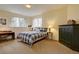 Cozy bedroom with comfortable bed, natural lighting from the windows, and ample closet space at 10619 N Osceola Dr, Westminster, CO 80031