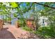 Backyard with a gazebo, gate, and gravel area at 3613 Julian St, Denver, CO 80211