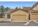 Attached one car garage for convenient parking and storage in this well maintained townhouse at 10507 W Maplewood Dr # E, Littleton, CO 80127