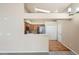 Bright living space featuring recessed lights and an open-concept design at 10507 W Maplewood Dr # E, Littleton, CO 80127