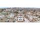Panoramic aerial view of the neighborhood, community buildings, parking lot, and distant mountains at 12478 W Nevada Pl # 208, Lakewood, CO 80228