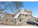 Inviting exterior of a multi-level home, showcasing its unique architecture in winter at 12478 W Nevada Pl # 208, Lakewood, CO 80228
