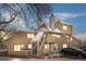 Inviting exterior of a multi-level home with snowy steps, showcasing its unique architecture at 12478 W Nevada Pl # 208, Lakewood, CO 80228