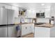 Bright kitchen showcasing butcher block countertops, stainless steel appliances, and ample storage at 12478 W Nevada Pl # 208, Lakewood, CO 80228