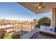 Relax on this charming balcony with ample seating and ceiling fan, perfect for enjoying city views at 7801 W 35Th Ave # 301, Wheat Ridge, CO 80033