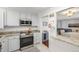 Well-equipped kitchen with stainless steel appliances and modern cabinetry at 7801 W 35Th Ave # 301, Wheat Ridge, CO 80033