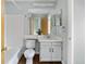 Bathroom with vanity and integrated sink, with tub and shower at 1653 S Blackhawk Way # B, Aurora, CO 80012