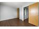 Bright bedroom includes closet, and door to in-unit washer/dryer at 1653 S Blackhawk Way # B, Aurora, CO 80012