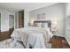 Bedroom features natural lighting, plank flooring and bathroom access at 1653 S Blackhawk Way # B, Aurora, CO 80012