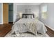 Bedroom features natural lighting, plank flooring and closet at 1653 S Blackhawk Way # B, Aurora, CO 80012