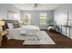Bedroom with natural lighting, fan and plank flooring at 1653 S Blackhawk Way # B, Aurora, CO 80012