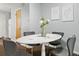Charming dining space featuring a marble table, comfortable seating, and stylish decor at 1653 S Blackhawk Way # B, Aurora, CO 80012