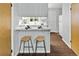 Bright kitchen with breakfast bar and modern appliances, perfect for casual dining at 1653 S Blackhawk Way # B, Aurora, CO 80012