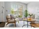 Bright living room with natural light, stylish furniture, and cozy rug at 1653 S Blackhawk Way # B, Aurora, CO 80012