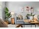 Comfortable living room area with a modern couch, pillows, and unique decorative accents at 1653 S Blackhawk Way # B, Aurora, CO 80012