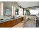 Luxurious bathroom with double vanity and soaking tub at 825 Circle Dr, Boulder, CO 80302