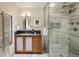 Modern bathroom with walk-in shower and floating vanity at 825 Circle Dr, Boulder, CO 80302