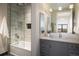 Modern bathroom with walk-in shower and gray vanity at 825 Circle Dr, Boulder, CO 80302