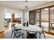 Modern dining room with marble table and mountain views at 825 Circle Dr, Boulder, CO 80302