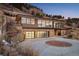 Contemporary home with circular driveway and mountain backdrop at 825 Circle Dr, Boulder, CO 80302