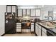 The kitchen featuring updated cabinets, countertops, and stainless steel appliances at 805 29Th St # 308, Boulder, CO 80303
