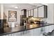 The kitchen featuring updated cabinets, countertops, and stainless steel appliances at 805 29Th St # 308, Boulder, CO 80303