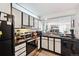 The kitchen featuring updated cabinets, countertops, and stainless steel appliances at 805 29Th St # 308, Boulder, CO 80303