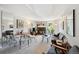 Cozy living room with a fireplace, balcony, round dining table and stylish furniture at 805 29Th St # 308, Boulder, CO 80303