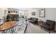 Bright living room featuring a fireplace, sliding doors to a balcony, and comfortable seating at 805 29Th St # 308, Boulder, CO 80303
