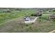 Areal view of the property showing a two-story home overlooking the lush green fairways of the golf course at 19887 Kershaw Ct, Monument, CO 80132