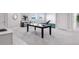 Recreational space featuring a ping pong table, neutral paint, carpeted floors, and seating area at 19887 Kershaw Ct, Monument, CO 80132